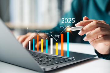 A businesswoman analyzes the profitability of operating companies using digital graphs, positive...