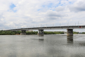 Omsk, Omsk Region, Russian Federation - June 6, 2024. Leningradsky Bridge over the Irtysh River