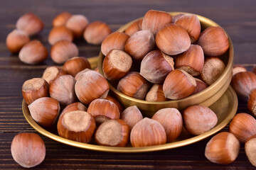 Hazelnuts on a dark wooden background.Close-up.	