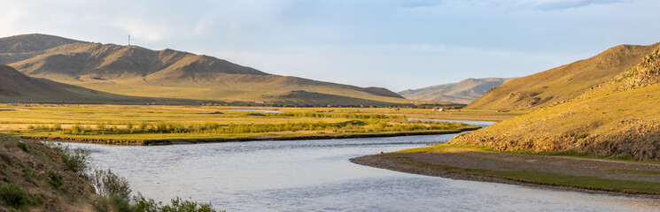 Panoramic view over the Herlen River, West Mongolia, in the evening light