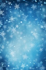 Fototapeta premium Holiday winter background with snowflakes against a blue bokeh backdrop