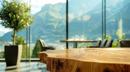 Empty wooden table with blurred mountain view background. Rustic wooden table perfect for product placement with a blurred background of a modern restaurant and a scenic mountain view.