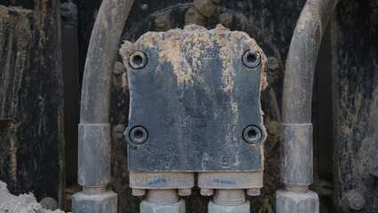 Mechanical parts.  Dirty mechanical components. Parts of an engine that resemble an insect.