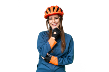 Young cyclist woman over isolated chroma key background with glasses and smiling