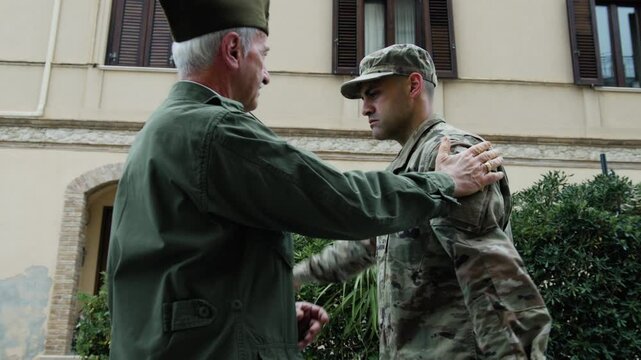 General Instills Valor In American Serviceman With Flag For His Service