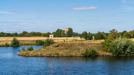 The junction between the River Ruhr and the Schifffahrskanal near the Grosse Ruhrinsel, Muelheim an der Ruhr, Ruhr Area, North-Rhine Westphalia, Germany