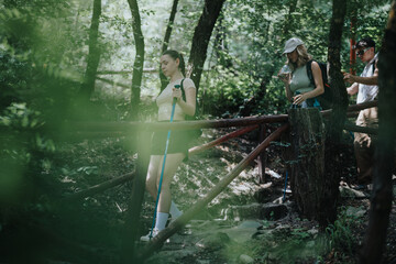 Group of friends hiking through a lush green forest together, enjoying nature and the outdoor adventure