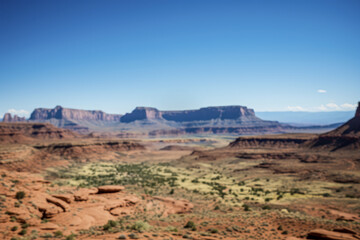 Blurred view of Navajo Monument Valley under clear blue sky