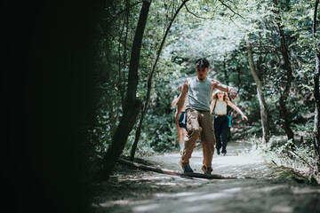 Group of friends hiking along a forest trail, enjoying nature and the outdoor adventure together.