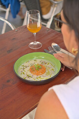 Elegant Outdoor Dining with Gourmet Dish and Wine