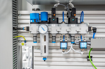 Compressed air preparation unit with pressure gauge 6 bars and two digital gauges mounted on the wall of technology