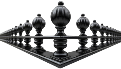 Close-up of symmetrical black chess pawns forming a geometric pattern, symbolizing strategy and precision in a game setting.