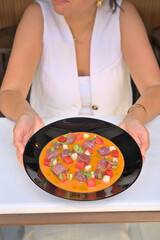 Elegant Tuna Tartar Served with Wine at a Restaurant