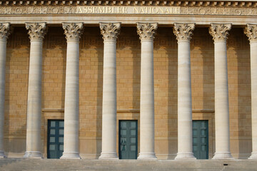 Naklejka premium Columns of the National Assembly building , aka Bourbon palace or chamber of deputies, elected representatives in the French parliament.