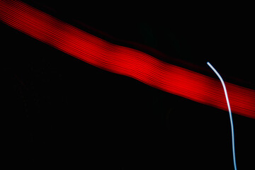 A red line is shown in a black background