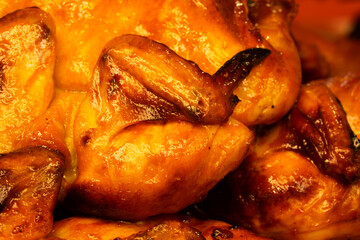 A pile of chicken wings are cooked and ready to eat