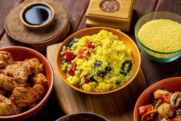 Couscous with dried fruits kritsa in spices and vegetables stewed on the table