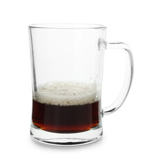 Almost empty mug of beer isolated on white