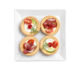 Delicious canapes with jamon, dry smoked sausages and vegetables isolated on white, top view