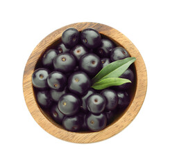 Fresh ripe acai berries in bowl and green leaves isolated on white, top view
