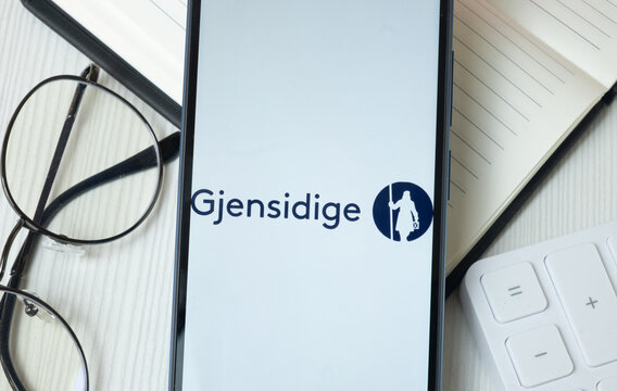 New York, USA - 21 June 2024: Gjensidige Forsikring Logo on Phone Screen, Company Icon