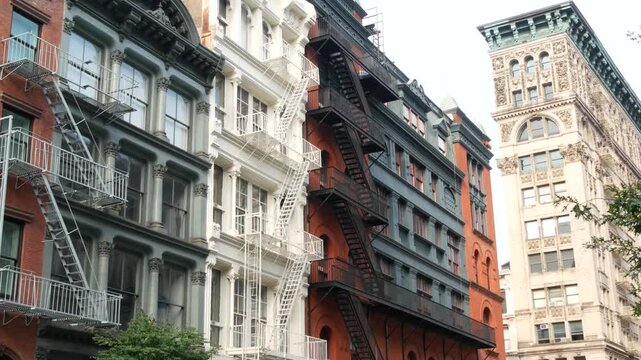 New York City Manhattan Soho fashion district, Broome street near Broadway. USA urban building facade, old classic american architecture in NYC, United States. Business and residential real estate.