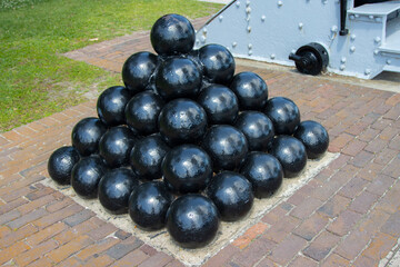 A historical stack of cannonballs.