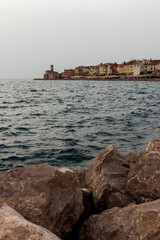 A sea town of Piran in the dusty sunset.