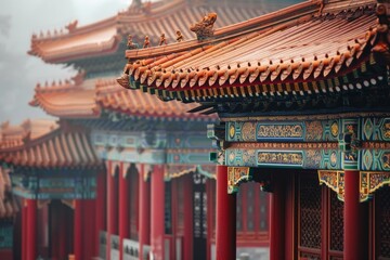 Obraz premium Traditional Chinese architectural details on a historical building, highlighting ornate carvings, curved rooflines, and rich, vibrant colors that reflect ancient craftsmanship