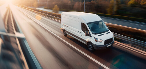 White modern delivery small shipment cargo courier van moving fast on motorway road to city urban suburb. Business distribution and logistics express service. Mini bus driving on highway on sunny day