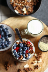 Overnight oat with berries and white yogurt in a glass