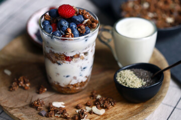 Overnight oat with berries and white yogurt in a glass
