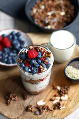 Overnight oat with berries and white yogurt in a glass