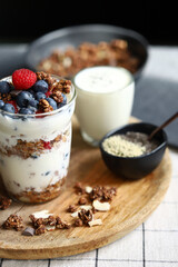 Overnight oat with berries and white yogurt in a glass