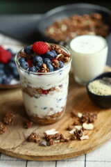 Overnight oat with berries and white yogurt in a glass