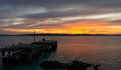Sunset over the bay and the forgotten pier.