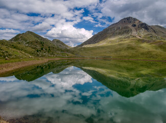 Fototapeta premium View on a lake and mountains above Defereggental valley on a summer day