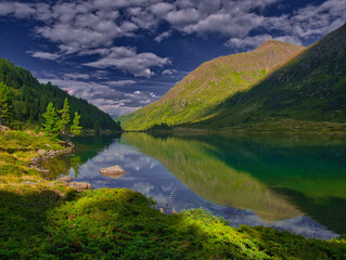 View on Obersee lake and mountains above Defereggental valley on a summer day