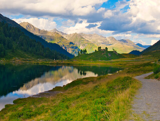 Fototapeta premium View on Obersee lake and mountains above Defereggental valley on a summer day