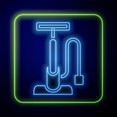 Glowing neon Bicycle air pump icon isolated on blue background. Vector
