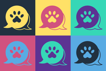 Pop art Paw print icon isolated on color background. Dog or cat paw print. Animal track. Vector