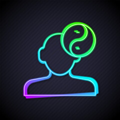 Glowing neon line Yin Yang symbol of harmony and balance icon isolated on black background. Vector