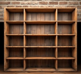 Empty wooden bookshelf set against a rustic brick wall, perfect for adding charm and functionality to any living space or office.
