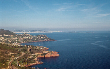 view of the French Riviera coastline with Esterel mountain range dropping into the Mediterranean sea