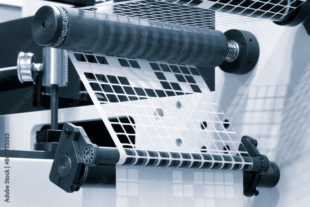 Poster a roll of white paper is passed through the machine. printer and sticker machine, which is used for 