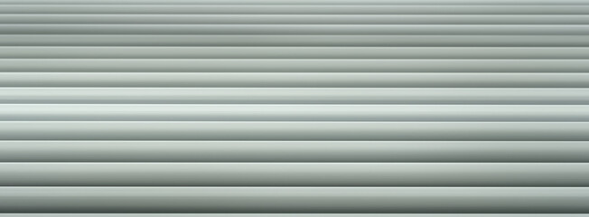 Obraz premium The image is a series of long, thin, white lines. The lines are arranged in a way that creates a sense of movement and direction