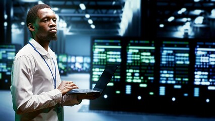 Engineer walking through cryptocurrency mining facility server rows solving complex mathematical equations. Expert in data center housing blockchain technology high volume real time transactions