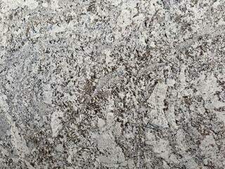 A polished granite marble kitchen surface exudes luxury and elegance, combining durability and sophisticated aesthetics for a timeless interior design.