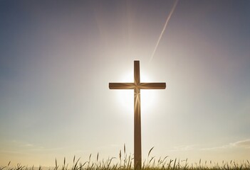 Golden hour silhouette of the cross in a field with a backdrop of the rising sun, reflecting themes of faith, resurrection, and spiritual belief