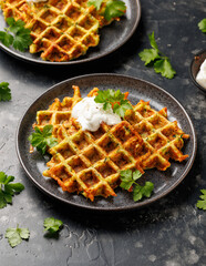 Homemade zucchini waffles in a rustic plate. Healthy food.